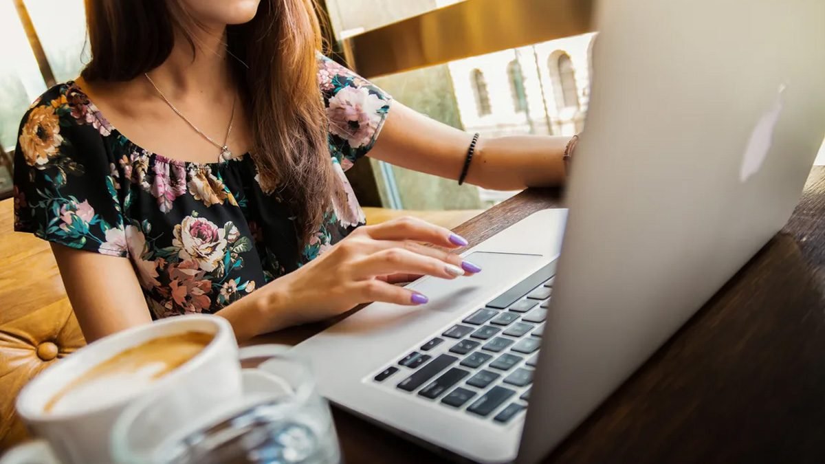 A Woman Working On Laptop