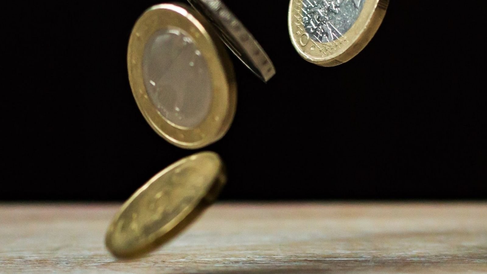 Coins Falling On The Ground