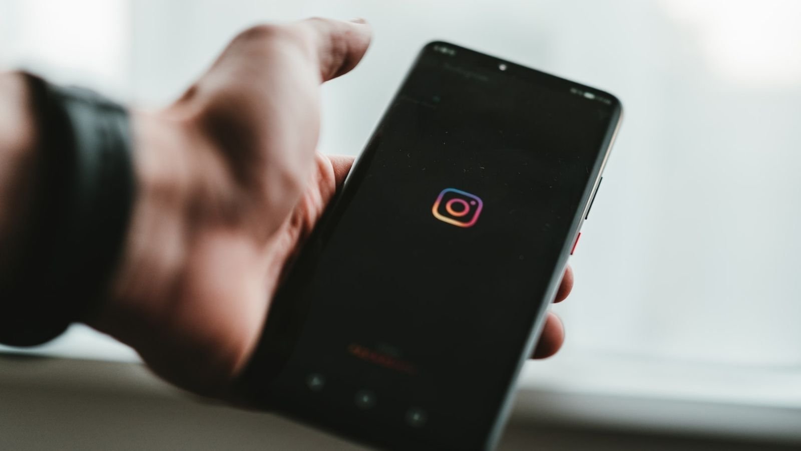 Person Holding Mobile