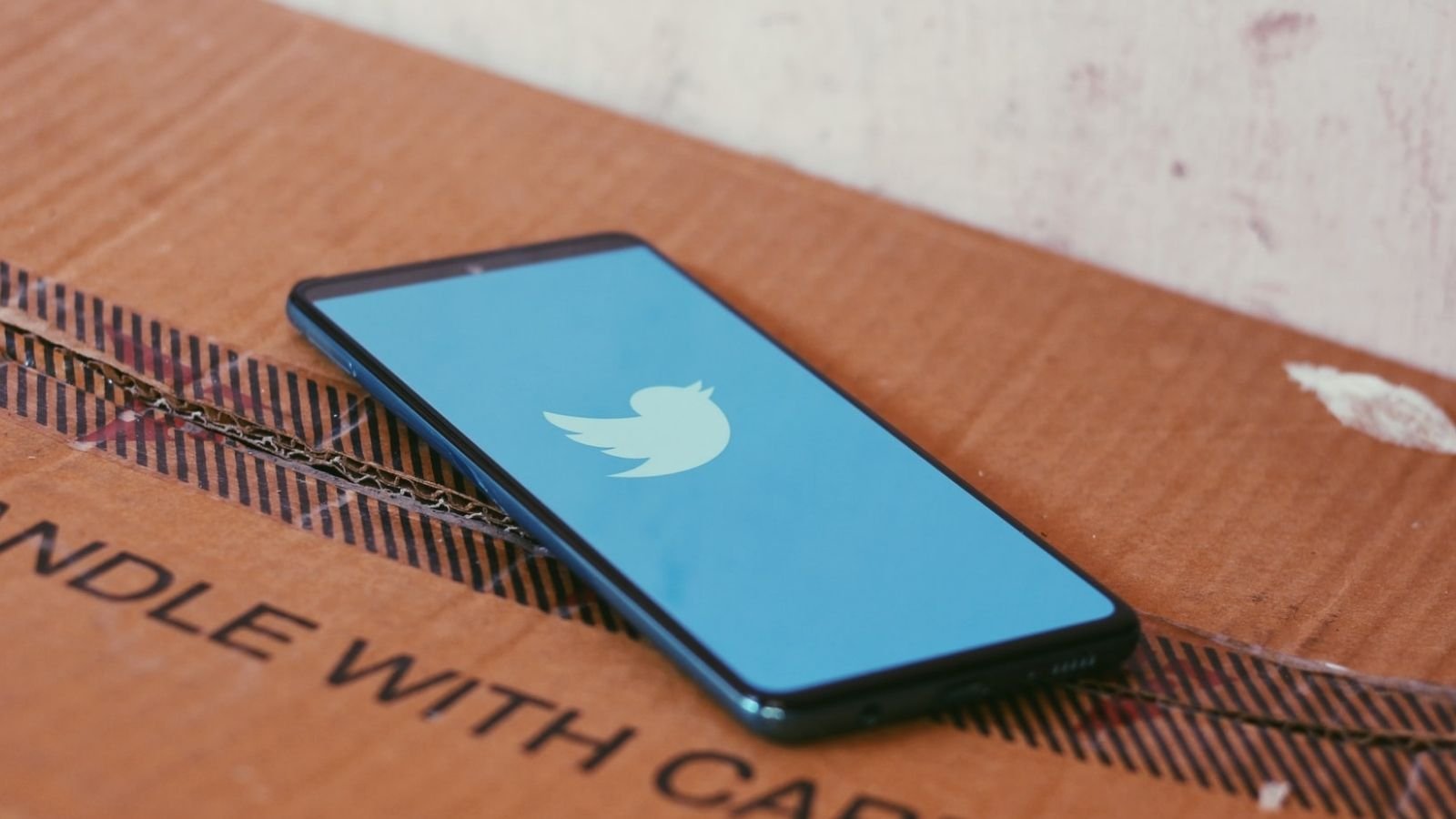 Twitter Blue On Brown Box