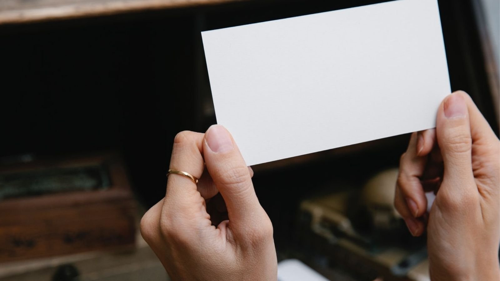 Person Holding Display