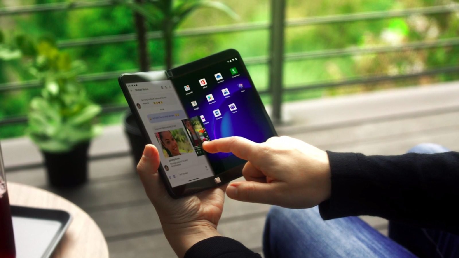 A User Using Microsoft Surface Duo 2