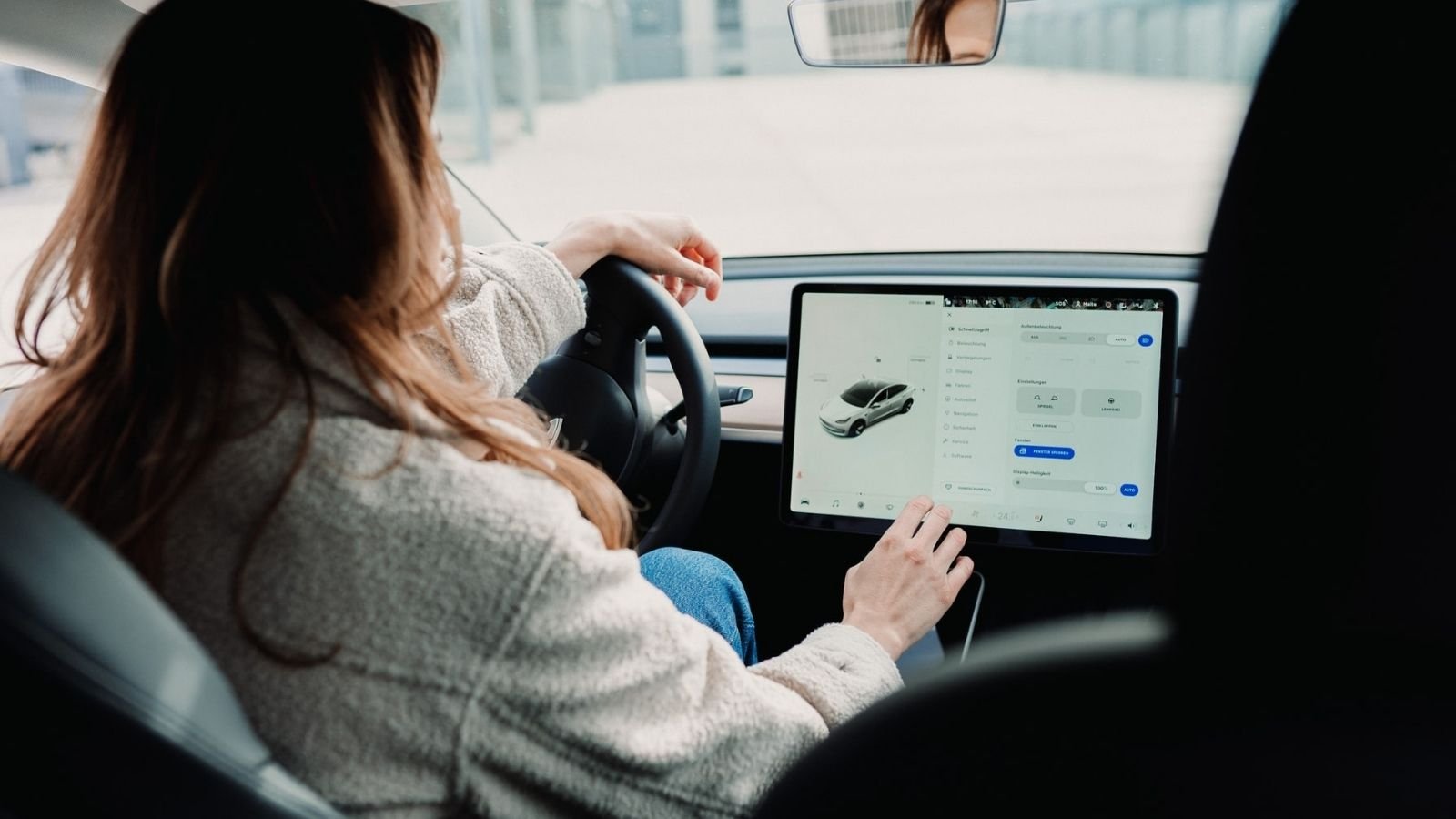 Woman Driving Electric Car