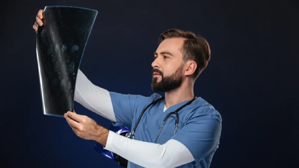 Doctor Checking X-Ray Report
