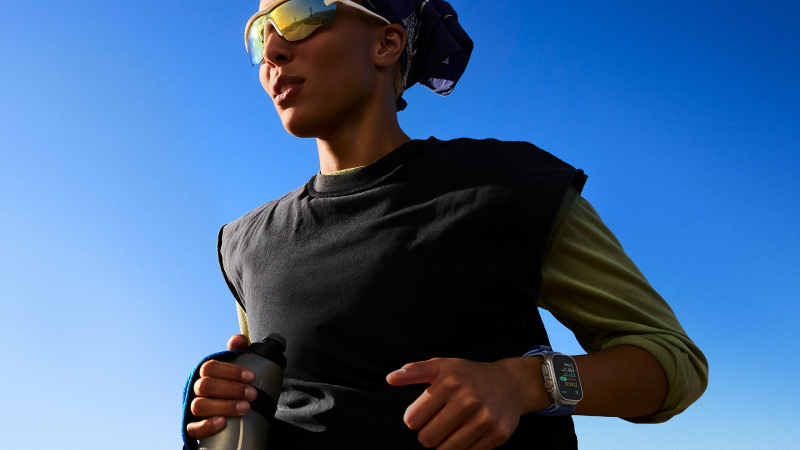 a fitness women wearing apple watch series 11