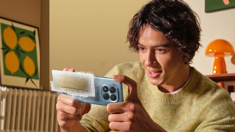 a man holding note 15