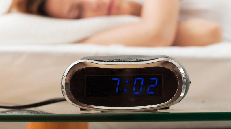 red-haired-woman-sleeping-bed-home